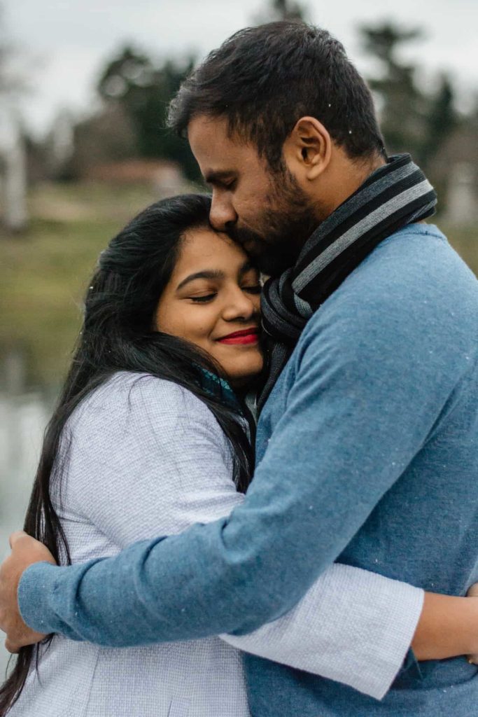 An Indian couple hugging each other