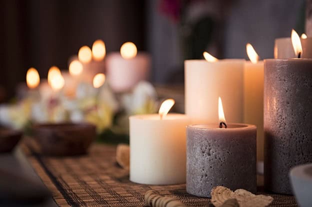 Candles burning at a yoga therapy session