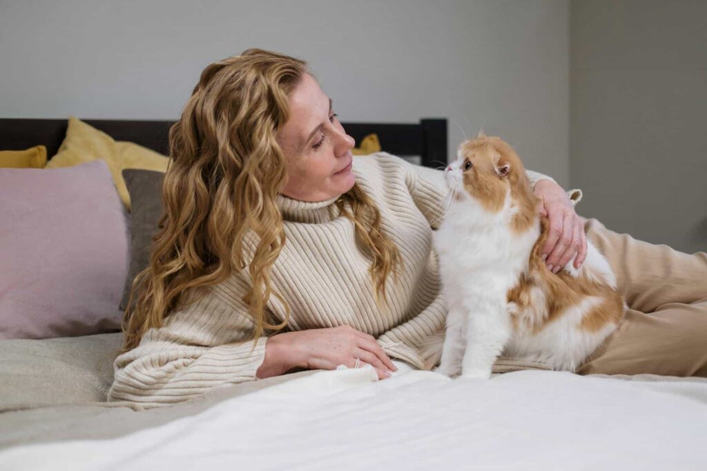 A lady with her cat